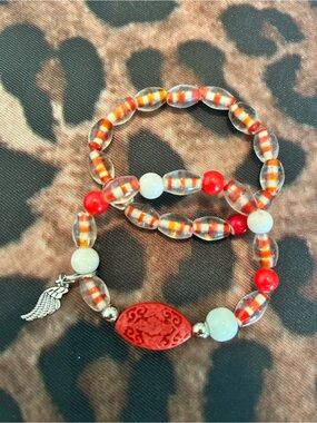 Red and White Beaded Stretch Bracelet with Wing Charm - Unbranded